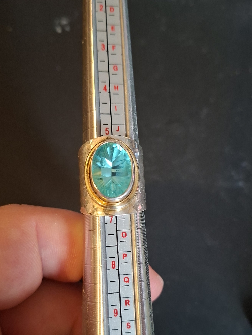 Sterling Silver Blue Topaz Gilt Bezal Set Ring